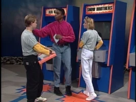 Phil Moore Wears High-Waisted Jeans