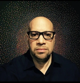 Christopher A. Reid