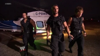 The Undertaker & Team Hell No face The Shield
