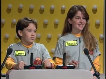 Phil Moore Wears a Gold Shirt