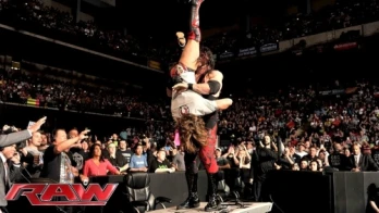 Demon Kane attacks Bryan