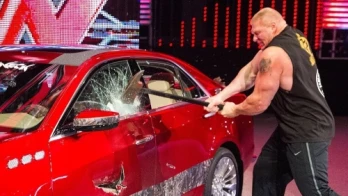 Brock Lesnar destroys J&J Security's prized Cadillac