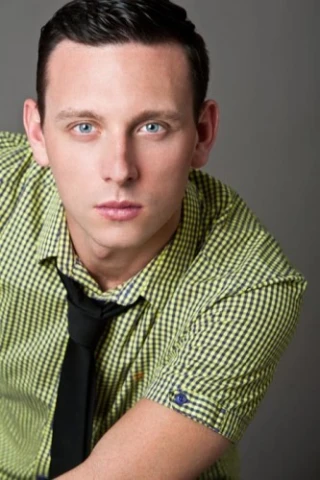 Ryan E. Kelly