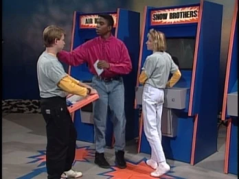 Phil Moore Wears High-Waisted Jeans