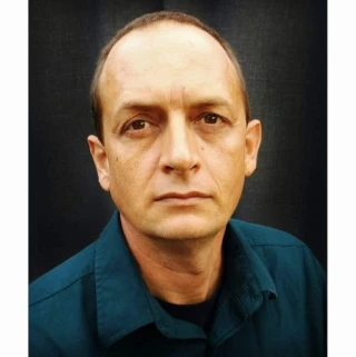 Justin P. Warren