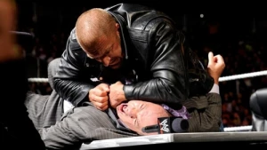 Triple H signs a fateful WrestleMania contract