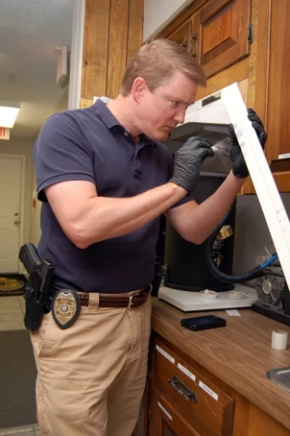 Mark E. McCann