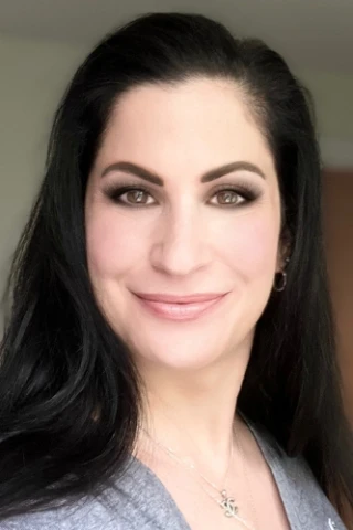 Anita S Martin
